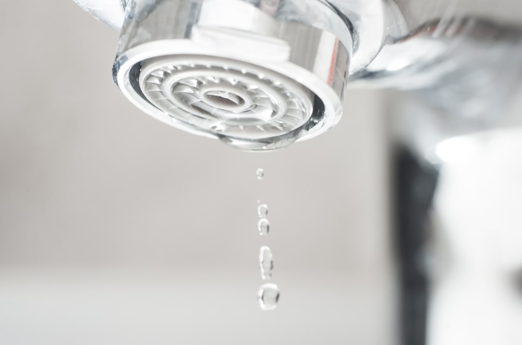 How to Fix a Dripping Faucet and Stop Wasting Water