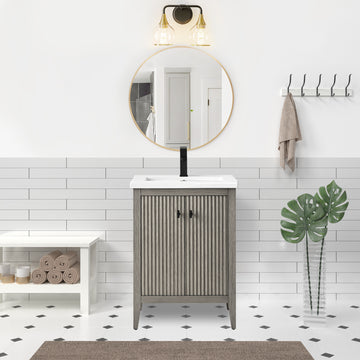 VanityArt 24-inch gray two-door freestanding bathroom vanity with white sink, black faucet, front view in bathroom