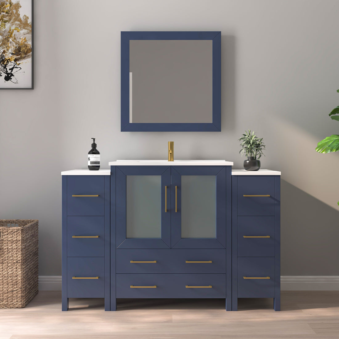 VanityArt 54-inch navy blue single-sink bathroom vanity with dual side towers, gold hardware, white countertop, and wall mirror