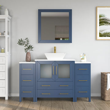Front view of 54-inch navy blue bathroom vanity with dual side cabinets, centered vessel sink, gold faucet, and mirror