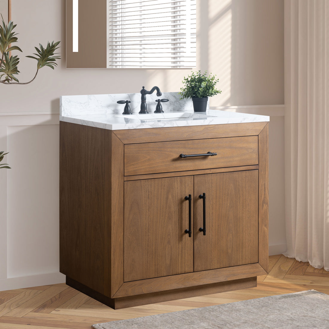 36-inch walnut bathroom vanity with marble top in neutral bathroom setting with mirror and plant decor