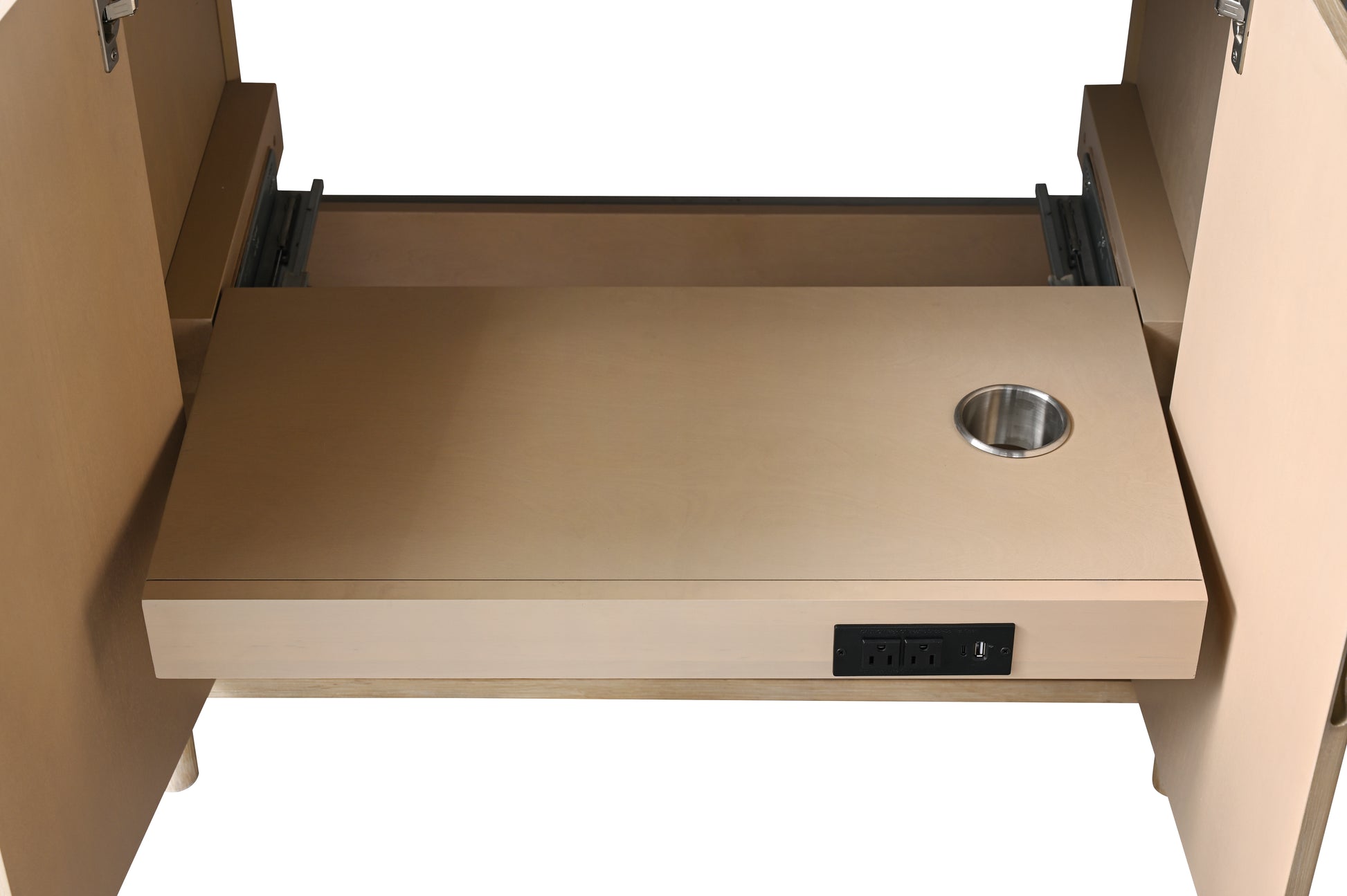Interior pull-out shelf with cord management hole and power outlet strip inside light oak vanity cabinet