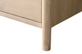 Close-up of VanityArt vanity rounded solid wood leg and drawer base showing natural oak grain and finish detail