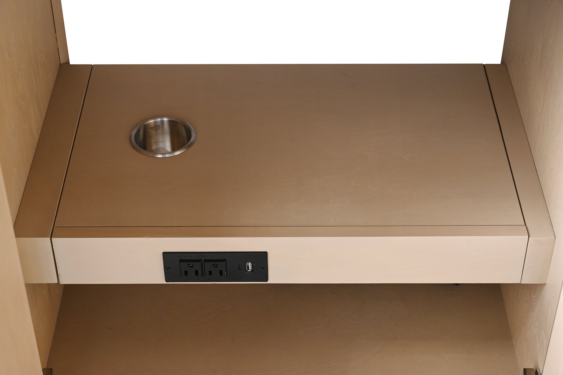 Interior view of VanityArt vanity pull-out tray with stainless steel cup cutout and built-in electrical outlets and USB port