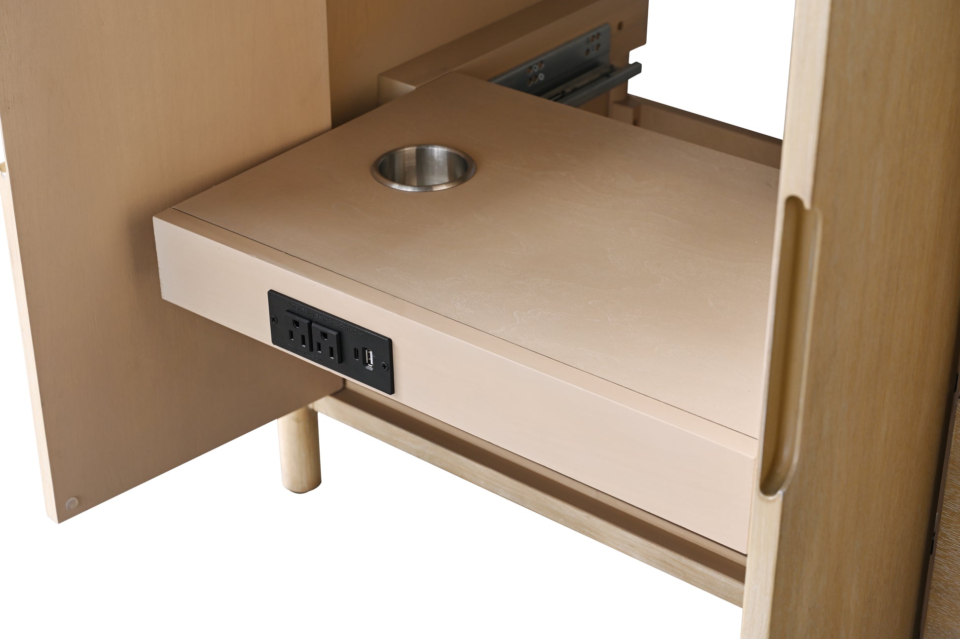 Close-up of 42-inch vanity pull-out shelf with built-in power outlets and metal cup holder, light wood finish