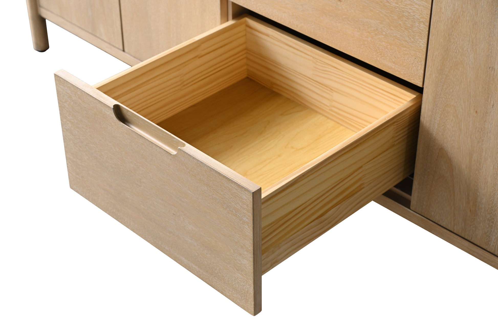 Close-up of single open light oak drawer interior showing dovetail wood box construction