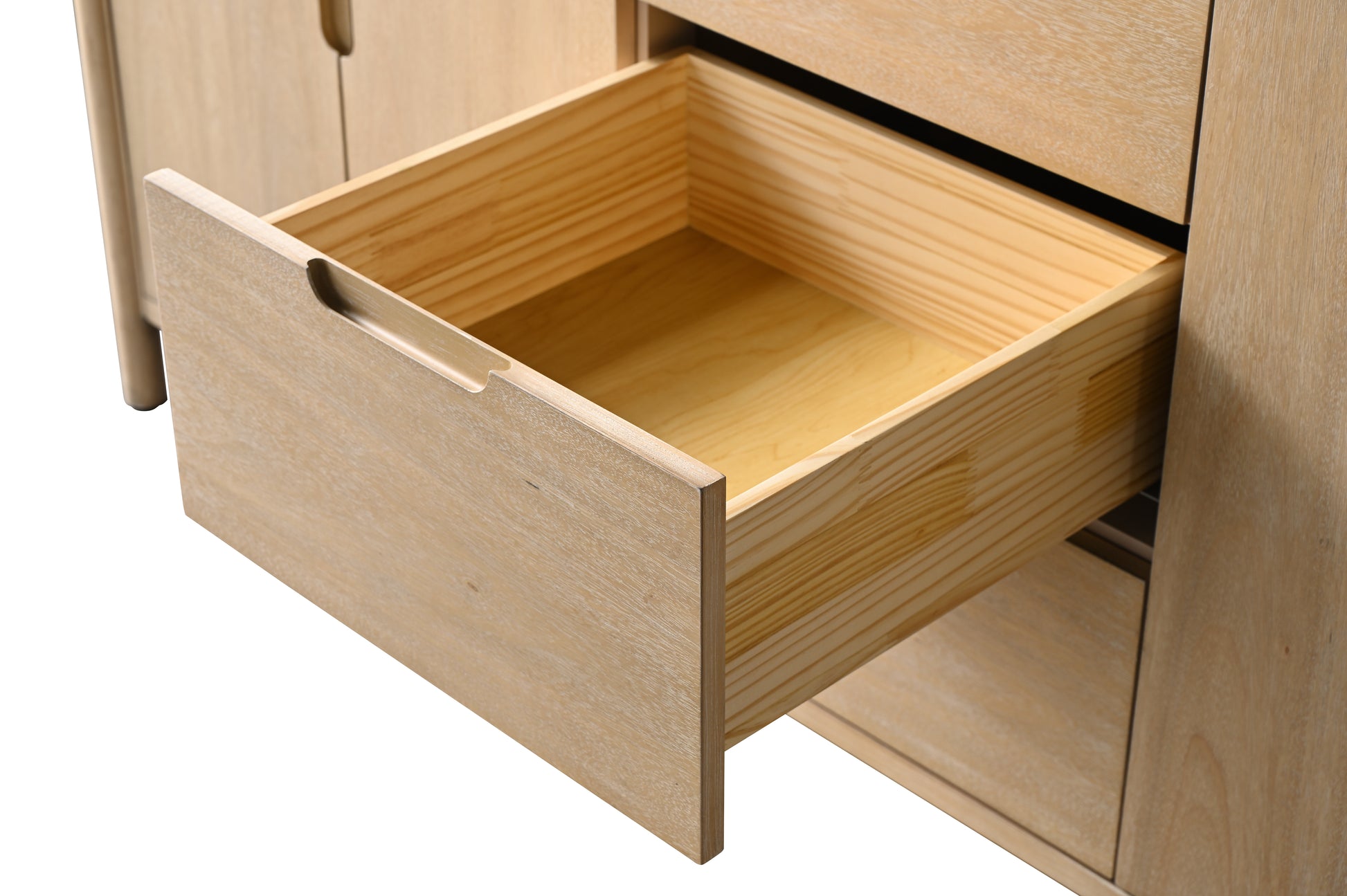 Side-angle close-up of open light oak drawer showing solid wood box and smooth glide construction