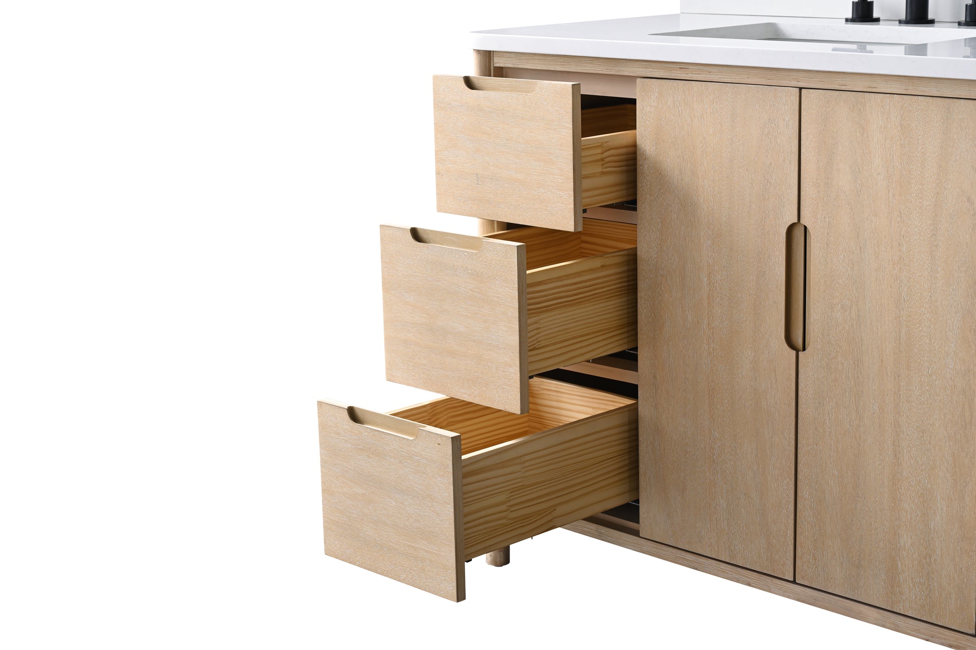 Close-up of three open dovetail drawers on right side of light oak bathroom vanity with white stone top
