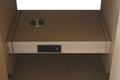 Pull-out shelf with built-in power outlet and USB port inside light oak bathroom vanity center cabinet