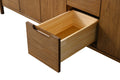 Detail of single open small walnut drawer with pine interior showing dovetail corner joinery