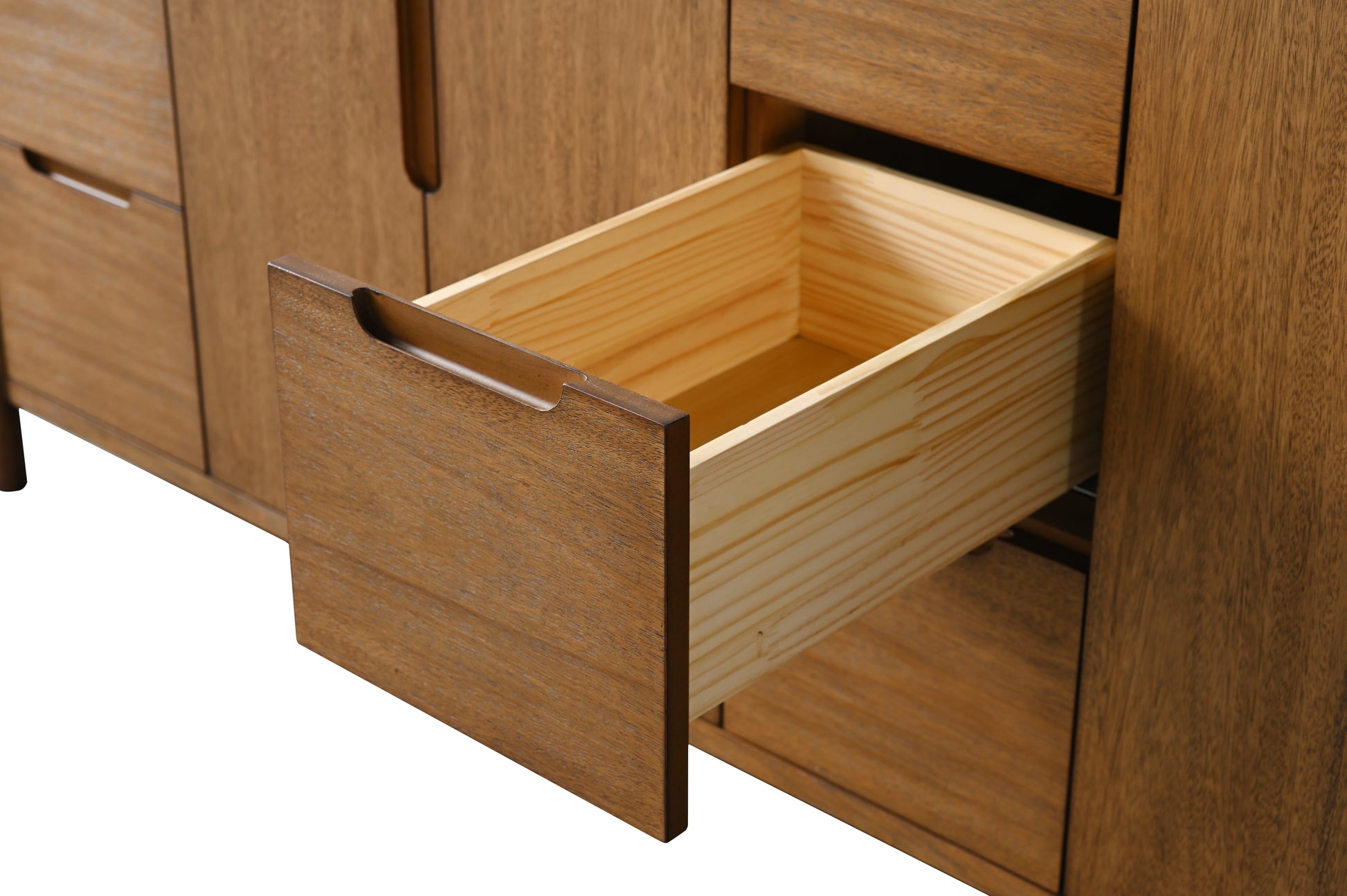 Detail of lower open walnut vanity drawer with pine dovetail box and soft-close undermount slides