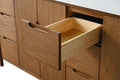 Center open drawer detail of walnut vanity showing pine interior with dovetail joints and pull handle
