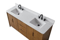 Close-up overhead angle of dual undermount sinks on white engineered stone top with black faucets