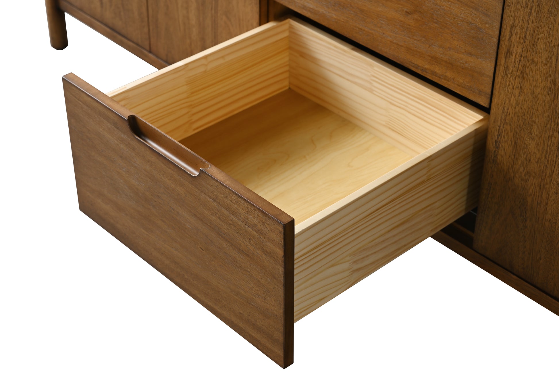 Close-up of open dovetail wood drawer interior on walnut bathroom vanity