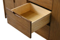 Detail of open solid wood dovetail construction drawer on walnut bathroom vanity cabinet