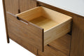 Close-up of bottom open drawer on walnut vanity showing solid wood box and satin bar pull handle