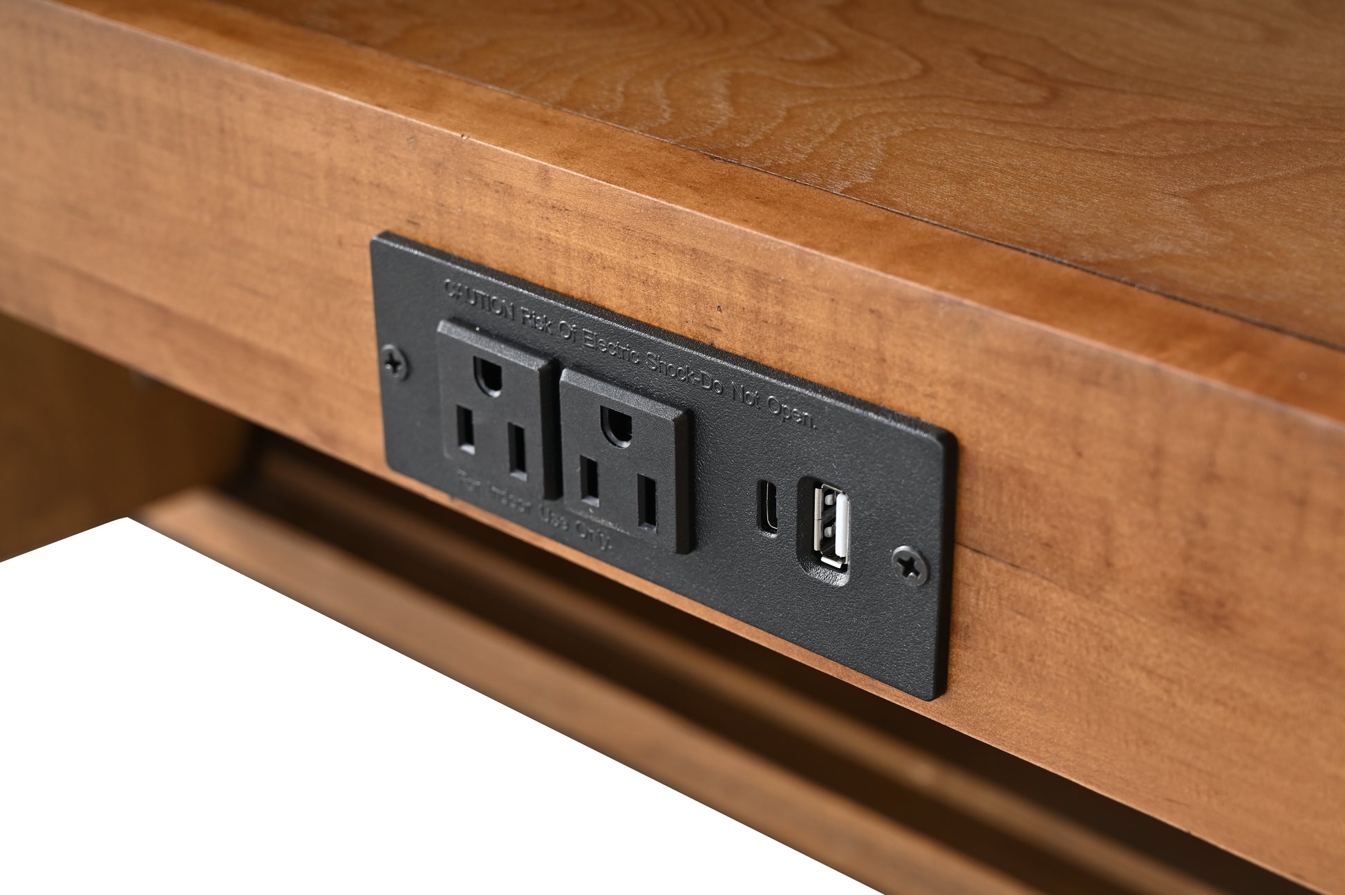 Close-up of built-in electrical outlet panel with two AC outlets USB-A and USB-C ports on vanity drawer