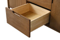 Close-up of single open solid wood drawer interior with oak box construction on walnut vanity