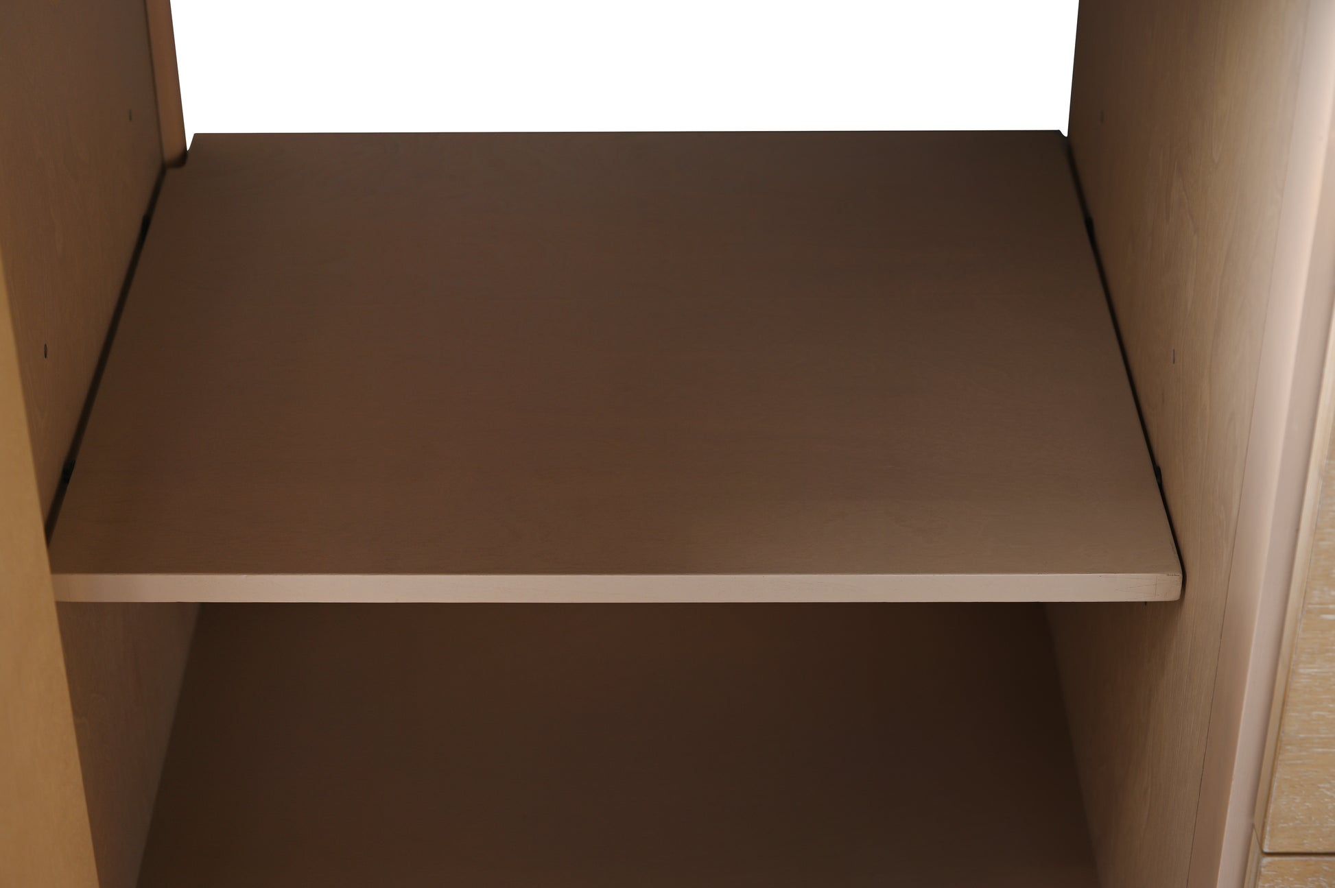 Adjustable interior cabinet shelf in light maple finish inside bathroom vanity storage compartment