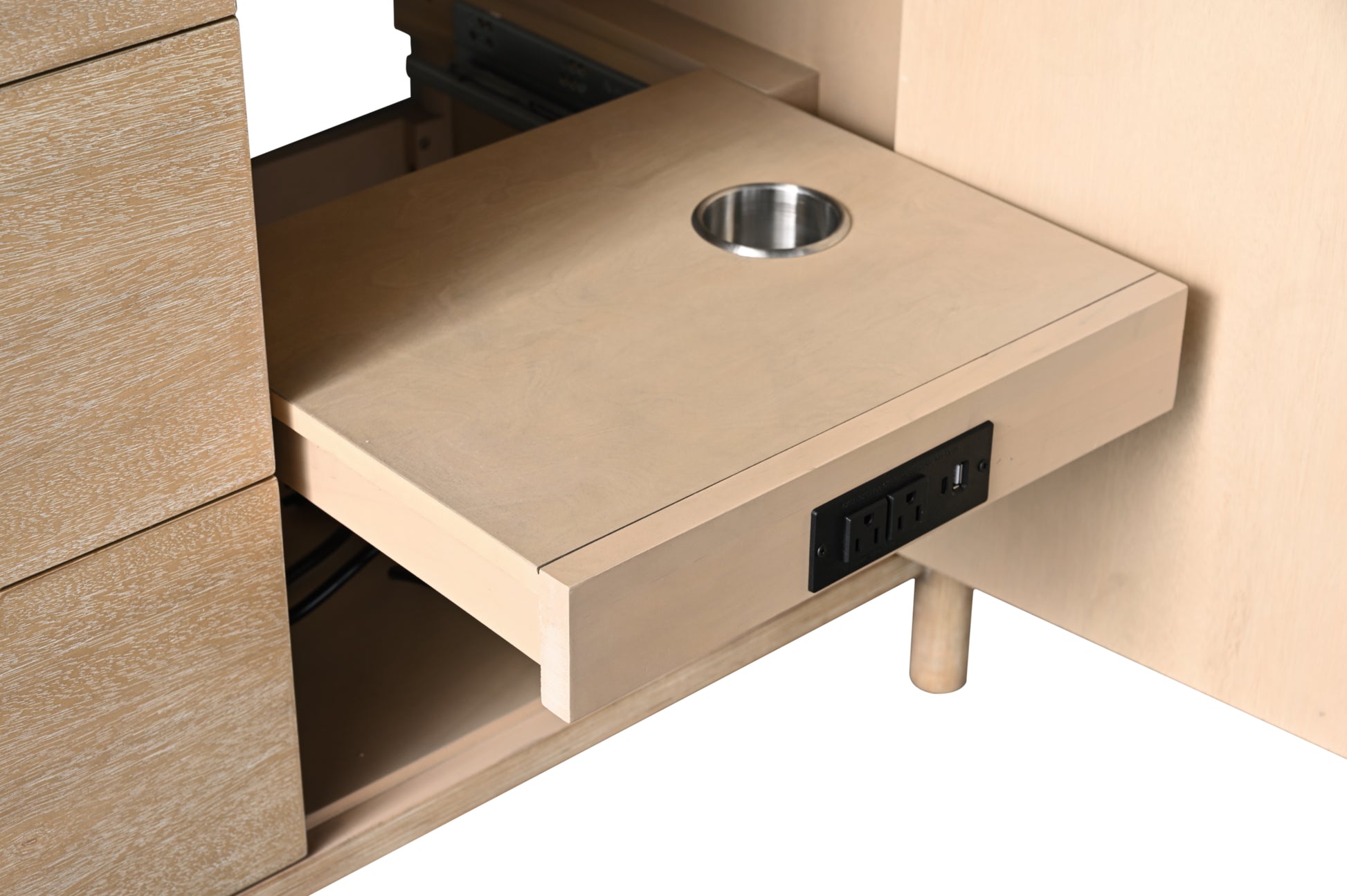 Pull-out power shelf with stainless steel grommet AC outlets and USB charging port inside oak vanity