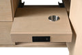 Extended pull-out charging shelf with stainless steel grommet and built-in power outlet inside vanity cabinet