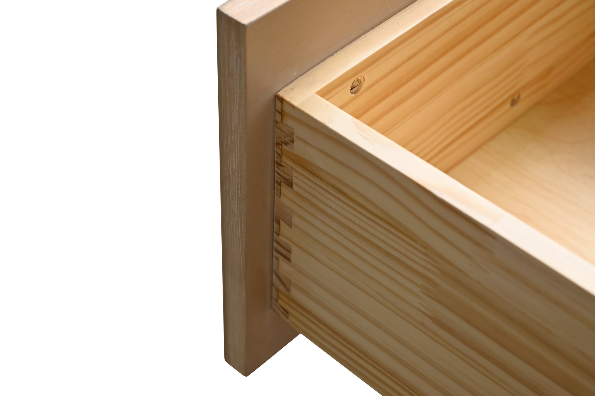 Close-up detail of dovetail joinery on solid wood drawer box of oak bathroom vanity
