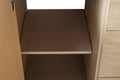 Interior view of open vanity cabinet door showing adjustable shelf inside light oak storage compartment