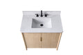Top-down view of 36-inch light oak vanity showing white Carrara stone countertop with undermount sink and black faucet
